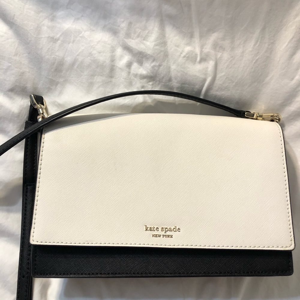 Used Kate Spade black and white color block crossbody bag with short chain strap